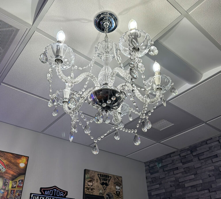 Crystal chandelier above the barber chair at Joni's Gentleman's Cuts