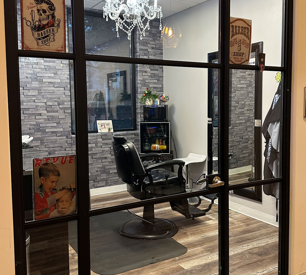 Barber near Centennial CO giving men’s haircut