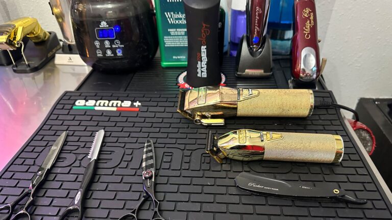 Barber station at Joni’s Gentleman’s Cuts with clippers, shears and a straight razor